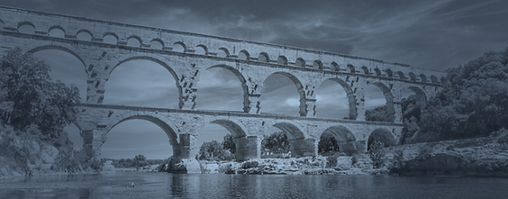 A blue-toned portrayal of the historic Pont du Gard aqueduct in France, showcasing its grand arches against a serene sky and reflecting river.